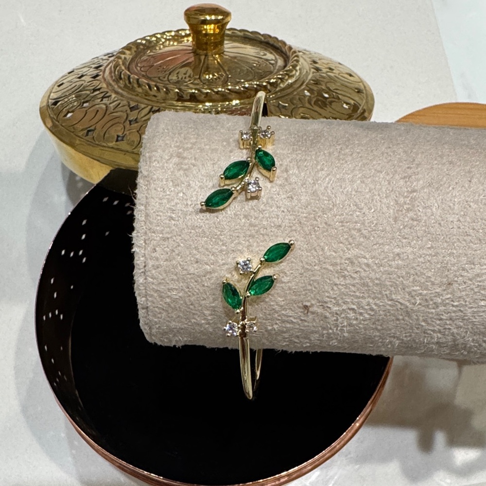 Elegant Gold and Green Leaf Bracelet